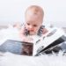 Baby reading black and white book