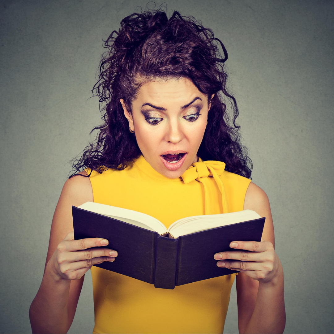 Shocked Woman Reading book